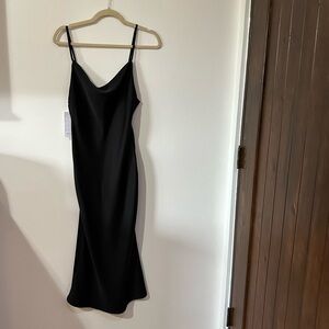🌟3/$20🌟 Black midi slip dress. NWT. Size xs